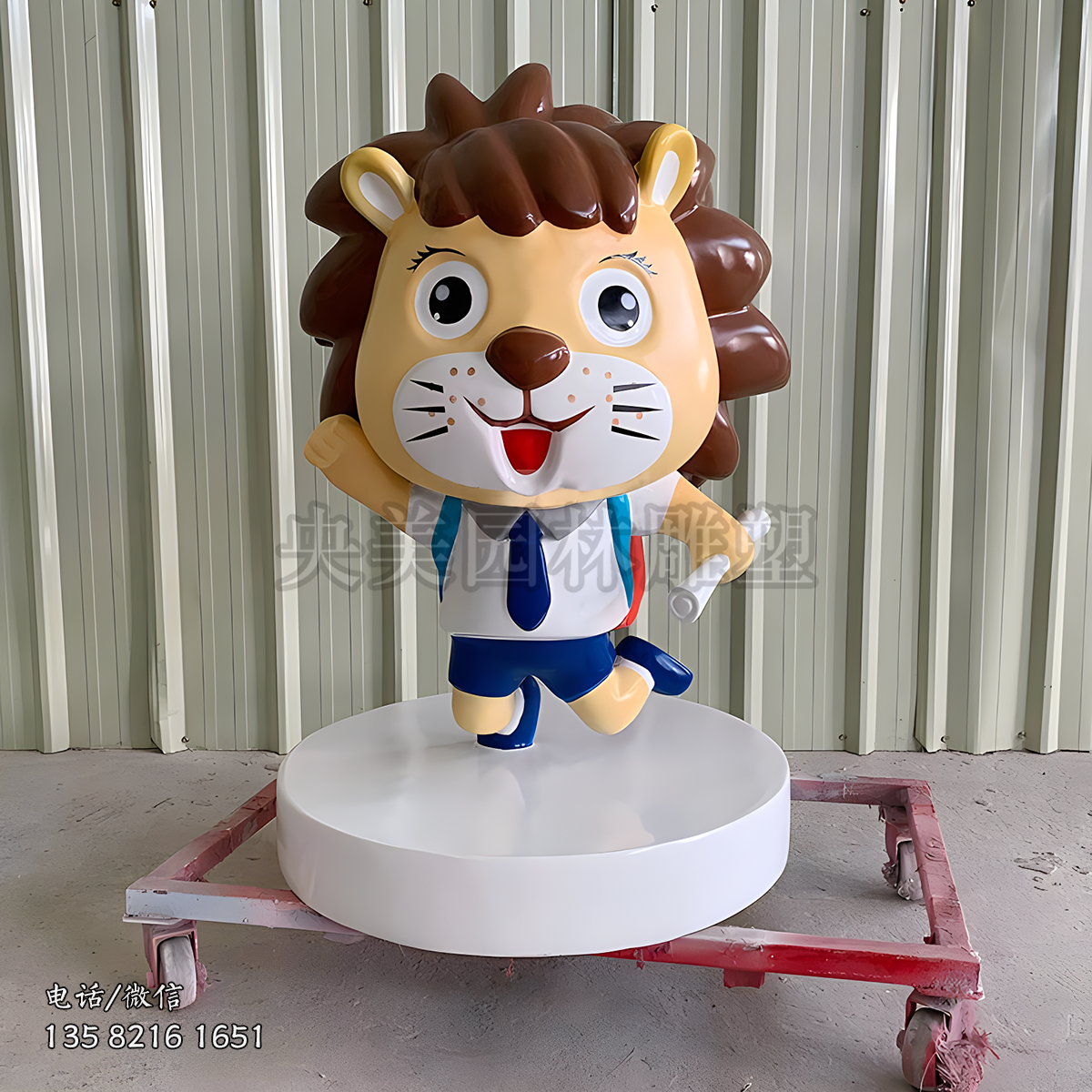 手拿試卷的小學生造型卡通獅子雕塑